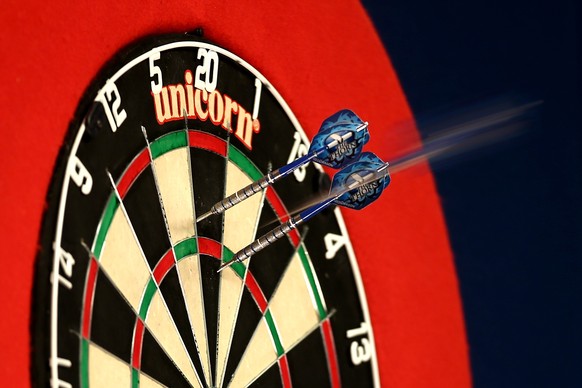 LONDON, ENGLAND - DECEMBER 27: A detailed view of darts in the dartboard during Day Seven of the William Hill PDC World Darts Championships at Alexandra Palace on December 27, 2014 in London, England. ...