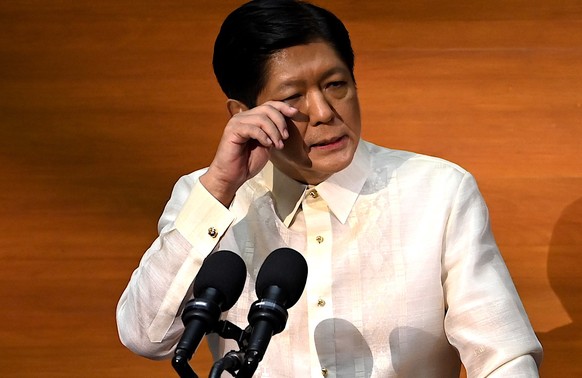 epa10091159 Philippines president-elect Ferdinand Marcos Junior gestures as he speaks during his first &#039;State of the Nation Address&#039; inside Philippine Congress in Manila, Philippines, 25 Jul ...