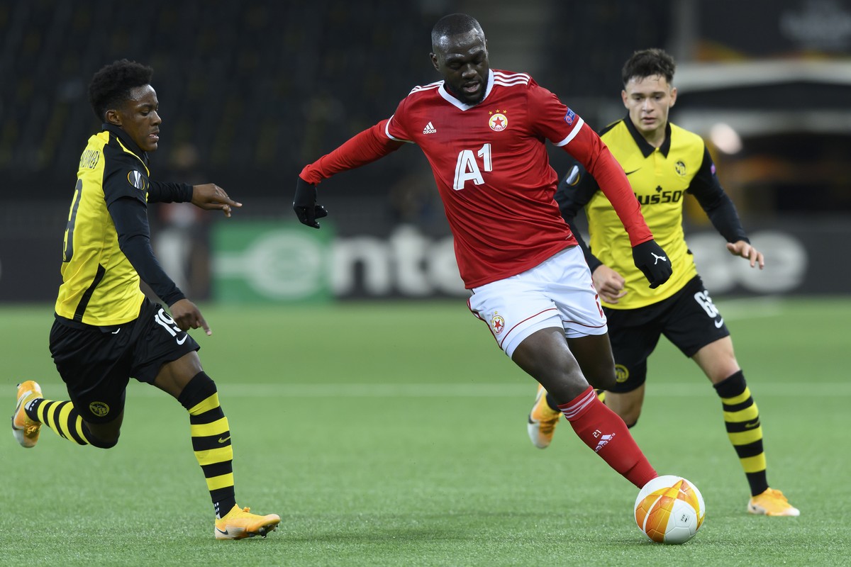 CSKA?s Amos Youga, center, fights for the ball against YB's Felix Mambimbi, left, and YB's Fabian Rieder, right, during the Europa League, Group A, soccer match between BSC Young Boys and PF ...
