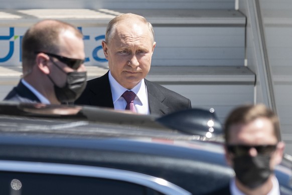 Russian president Vladimir Putin steps down the stairs from his airplane for the US - Russia summit with US President Joe Biden, on Geneva Airport Cointrin, Switzerland, Wednesday, June 16, 2021. (KEY ...