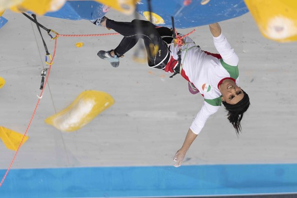 Iranian athlete Elnaz Rekabi competes during the women&#039;s Boulder &amp; Lead final during the IFSC Climbing Asian Championships, in Seoul, Sunday, Oct. 16, 2022. Rekabi left South Korea on Tuesday ...