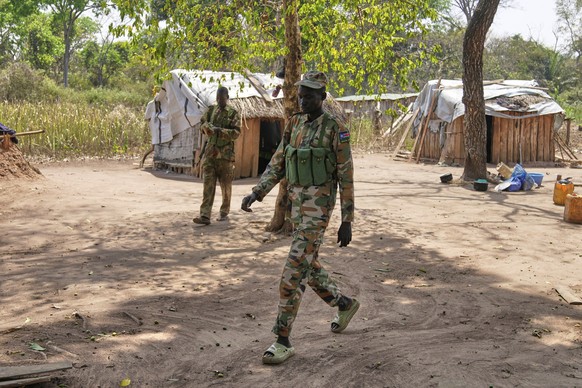 Soldiers walk around their outpost near Nzara, South Sudan on Saturday, Feb. 15, 2025. (AP Photo/Brian Inganga)
South Sudan Explainer