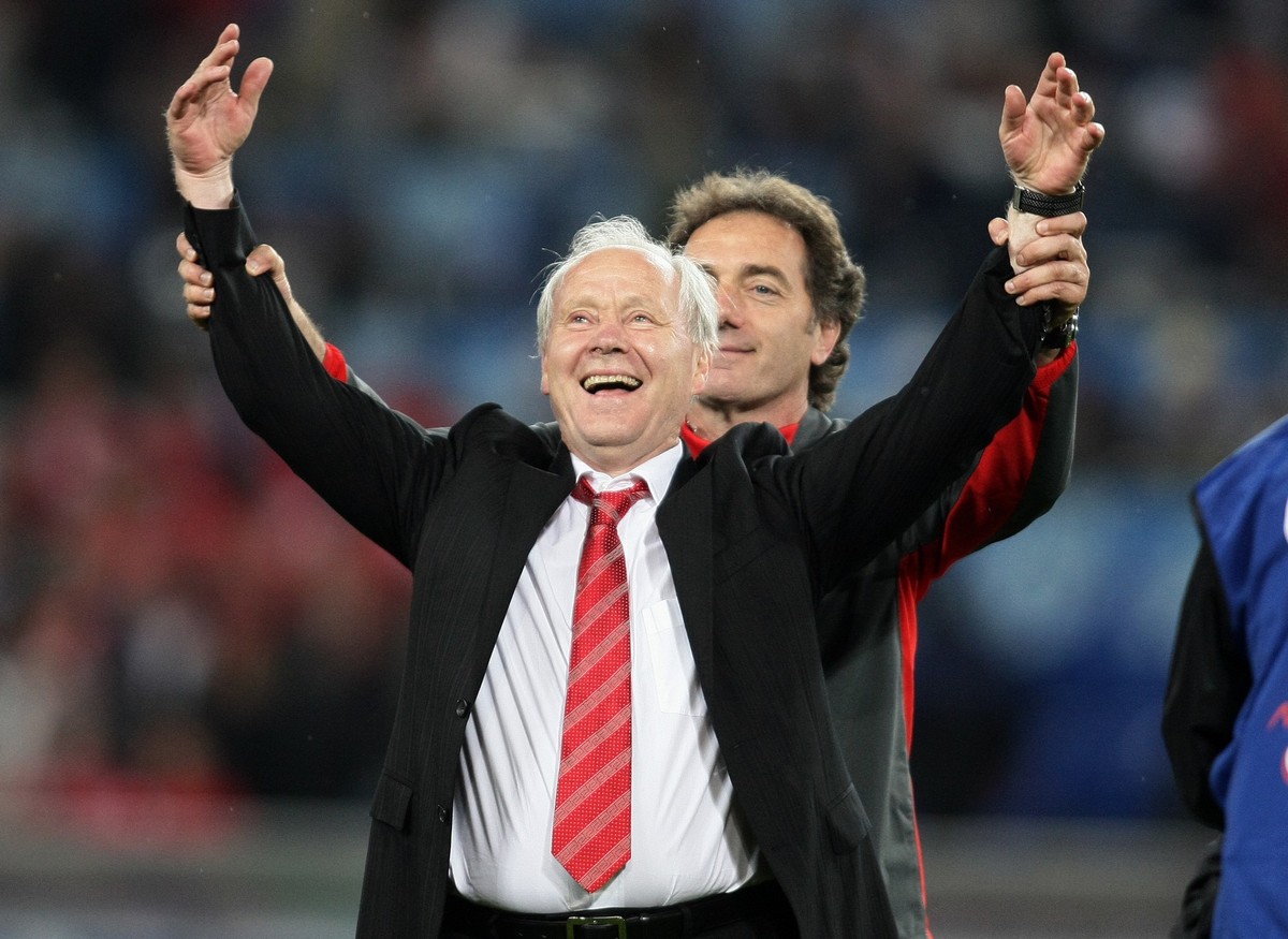 Switzerland's parting coach Jakob Kuhn greets the fans with assistant coach Michel Pont during the EURO 2008 preliminary round group A match between Switzerland and Portugal at the St. Jakob Park ...