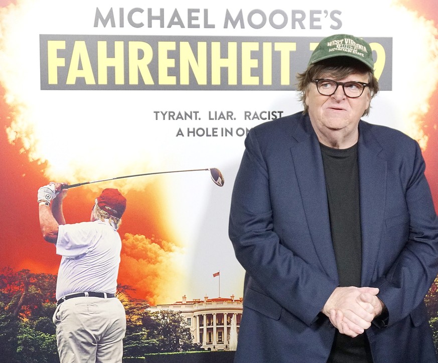 epa07033788 US producer Michael Moore arriving at the premiere of Briarcliff Entertainment&#039;s Fahrenheit 11/9 at Samuel Goldwyn Theater in Beverly Hills, California, USA 19 September 2018. The mov ...