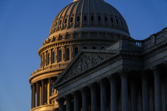 FILE - Sunrise at the U.S. Capitol, Monday, Dec. 19, 2022 in Washington. The House and the Senate are set to pass an overhaul of the Electoral Count Act, the arcane election law that then-President Do ...