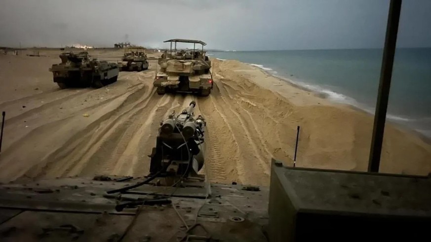 Tanks roll onto the Gaza Strip's Mediterranean beach: Israel expands its ground operations against Hamas.