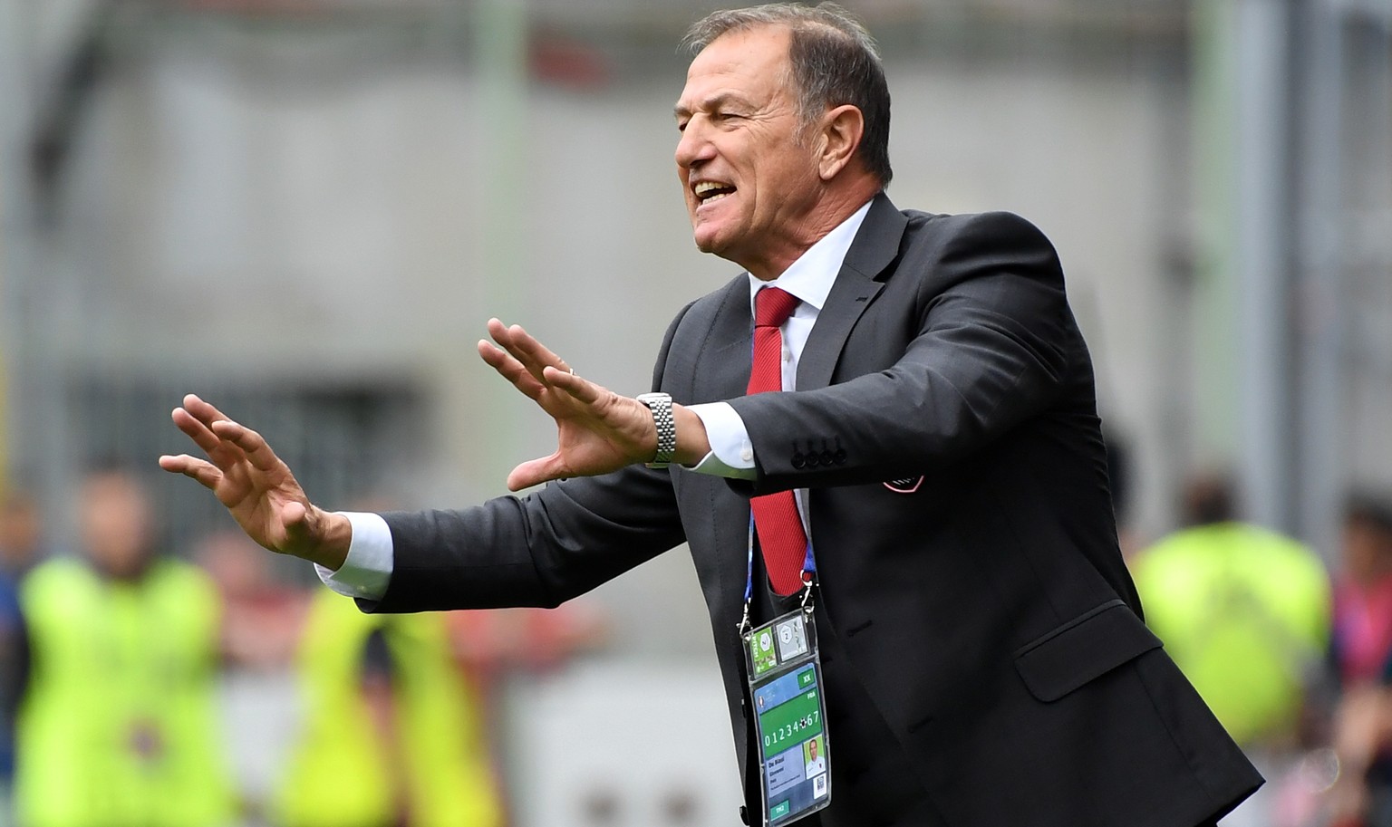 Albania coach Gianni De Biasi gestures during the Euro 2016 Group A soccer match between Albania and Switzerland, at the Bollaert stadium in Lens, France, Saturday, June 11, 2016. (AP Photo/Geert Vand ...