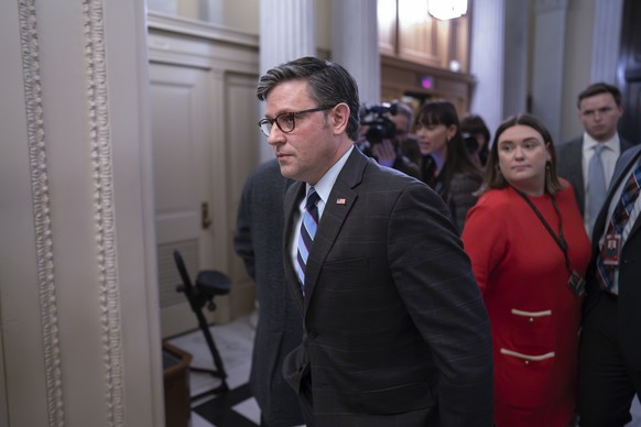 House Speaker Mike Johnson, R-La., enters the House chamber as lawmakers prepare to vote on the articles of impeachment against Homeland Security Secretary Alejandro Mayorkas for failures on the U.S.- ...