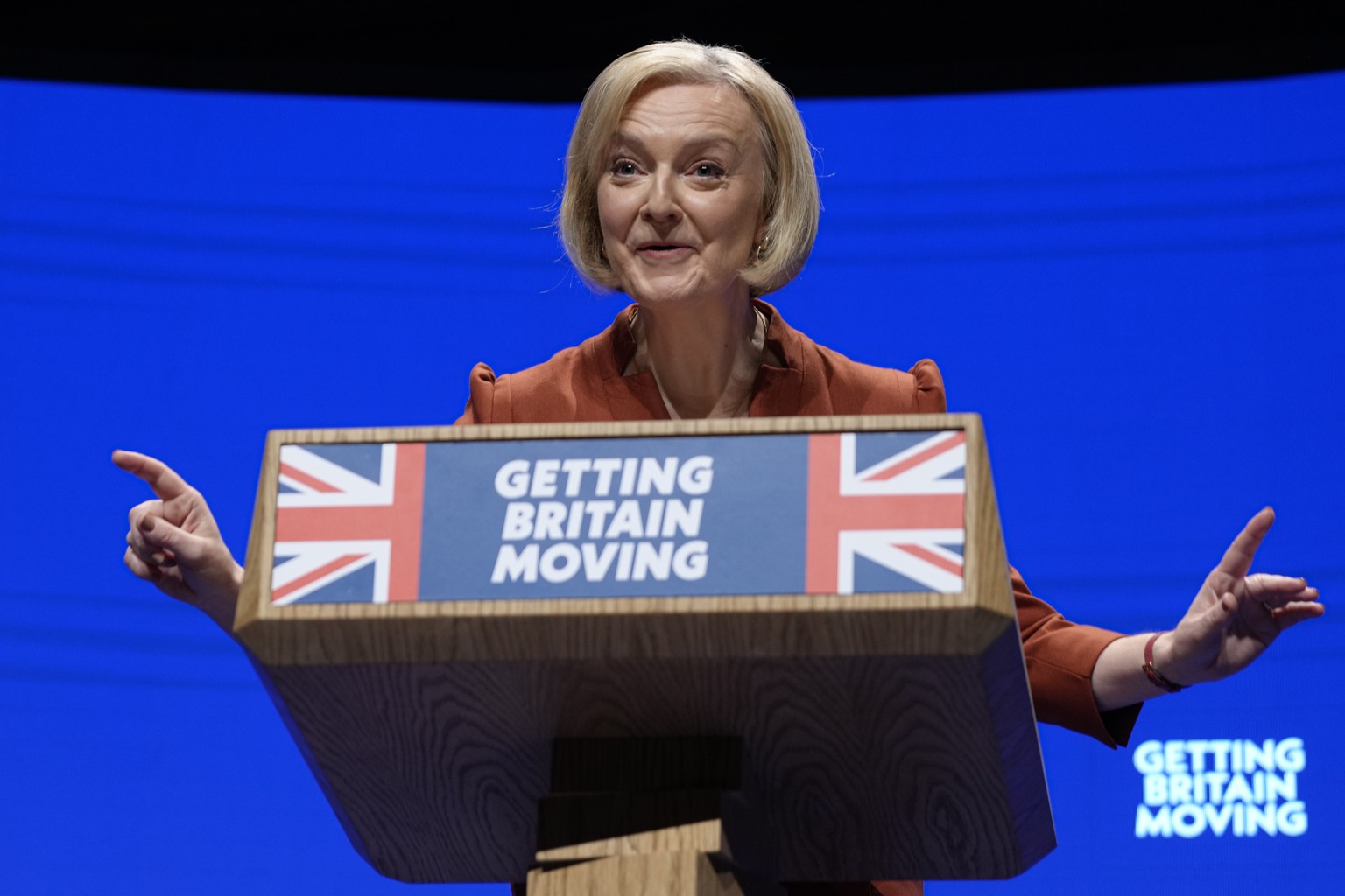 Britain's Prime Minister Liz Truss makes a speech at the Conservative Party conference at the ICC in Birmingham, England, Wednesday, Oct. 5, 2022. (AP Photo/Kirsty Wigglesworth)