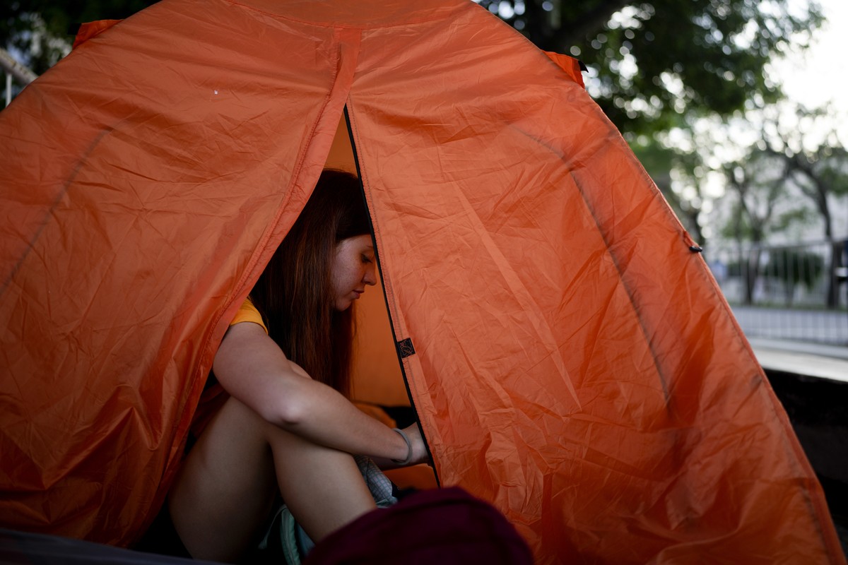 A fan of Taylor Swift camps outside Monumental stadium to secure a front-row spot for the next day's Eras Tour concert in Buenos Aires, Argentina, Wednesday, Nov. 8, 2023. (AP Photo/Natacha Pisar ...
