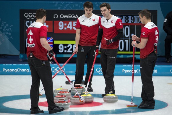 Claudio Paetz, Benoit Schwarz, Peter de Cruz and Valentin Tanner of Switzerland, from left, during the Curling tie-breaker game of the men between Switzerland and Great Britain at the XXIII Winter Olympics 2018 in Gangneung, South Korea, on Thursday, February 22, 2018. (KEYSTONE/Alexandra Wey)