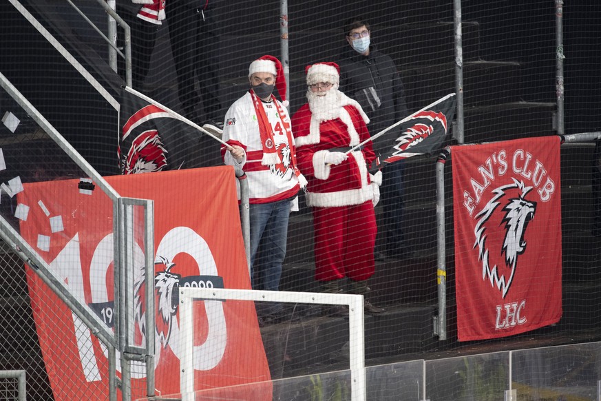 Lausanne fans during the preliminary round game of National League Swiss Championship 2021/22 between HC Lugano against Lausanne HC at the ice stadium Corner Arrena, Switzerland, Thursday, December, 2 ...