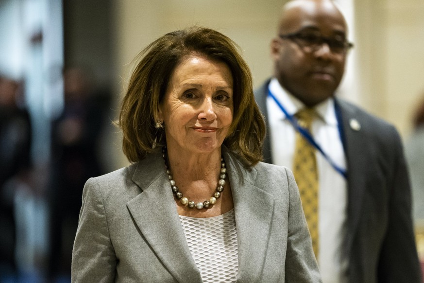 epa06675511 Democratic House Minority Leader from California Nancy Pelosi walks to a Congressional briefing from Defense Secretary James Mattis and Chair of the Joint Chiefs James Dunford on the Syria ...