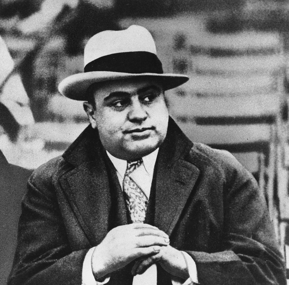FILE - This Jan. 19, 1931, file photo shows Chicago mobster Al Capone at a football game. The way President Donald Trump sees it, Capone, the most famous gangster in American history, got off easy com ...