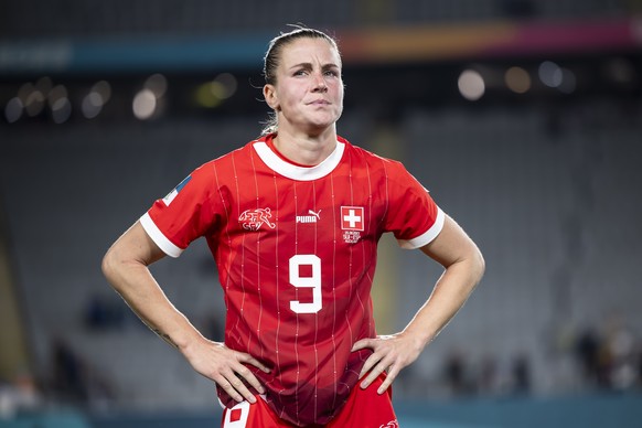 Switzerland&#039;s Ana Maria Crnogorcevic shows dejection next to Switzerland&#039;s defender Julia Stierli, left, after the team&#039;s 1-5 defeat and elimination from the tournament following the FI ...