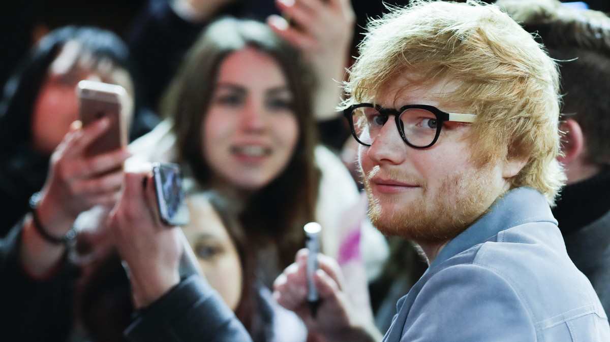 FILE - In this Friday, Feb. 23, 2018 file photo, singer-songwriter Ed Sheeran arrives for the screening of the film 'Songwriter' during the 68th edition of the International Film Festival Be ...