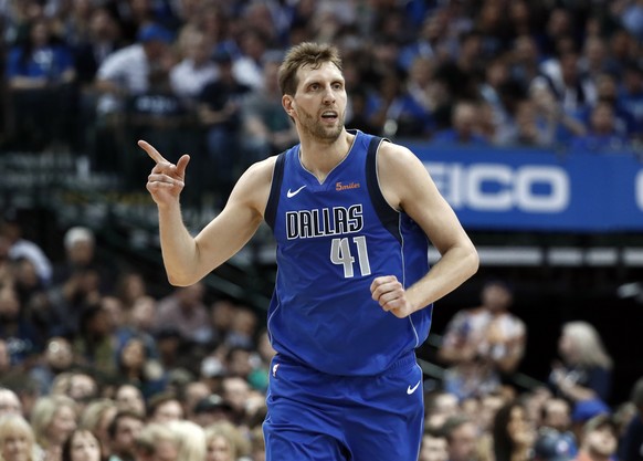 Dallas Mavericks&#039; Dirk Nowitzki (41) celebrates a basket against the Phoenix Suns during the first half of an NBA basketball game in Dallas, Tuesday, April 9, 2019. (AP Photo/Tony Gutierrez)