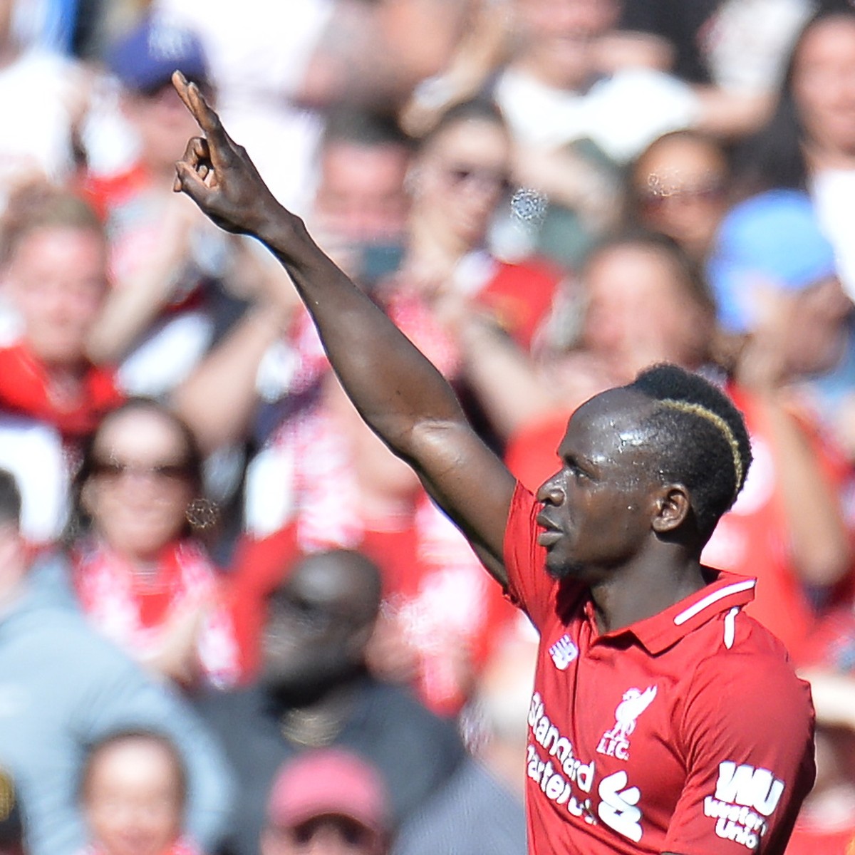 epa07564755 Liverpool's Sadio Mane celebrates after scoring the 2-0 goal during the English Premier League match between Liverpool FC and Wolverhampton Wanderers FC at Anfield, Liverpool, Britain ...