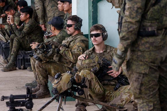Philippines and Australia conduct military exercises Australian and Filipino soldiers get ready prior to a live fire operation during a military exercise between the Philippines and Australia in Laur, ...