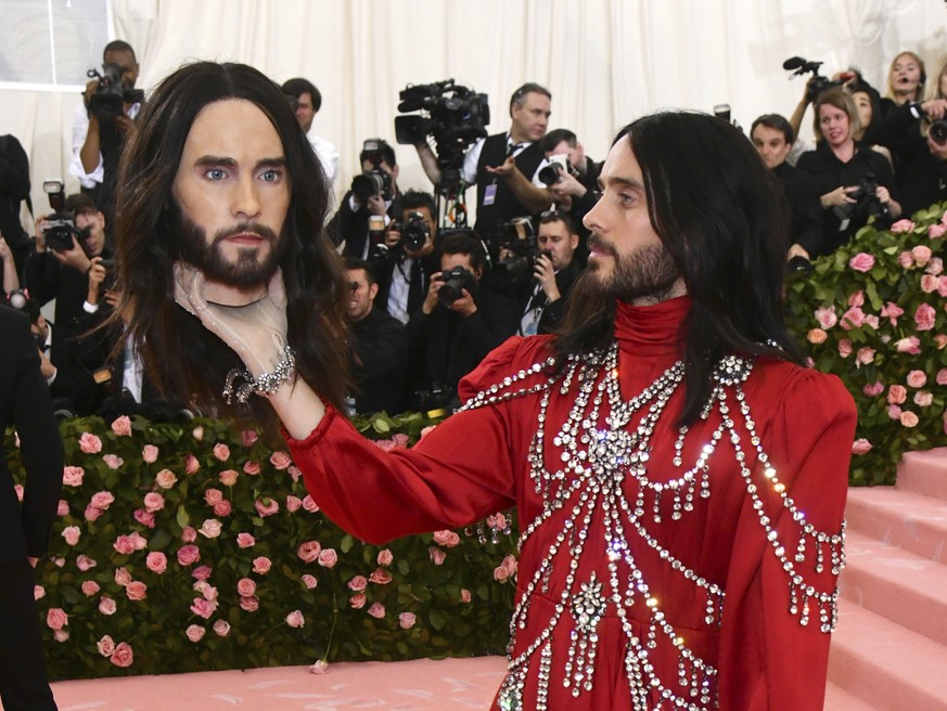 Jared Leto, holding a model of his own head, attends The Metropolitan Museum of Art's Costume Institute benefit gala celebrating the opening of the "Camp: Notes on Fashion" exhibition o ...