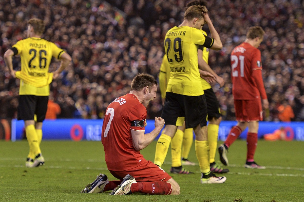 James Milner jubelt, Marcel Schmelzer kann's nicht fassen: Liverpool macht's in der Nachspielzeit.