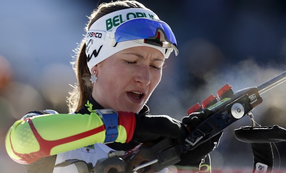 Belarus&#039; Darya Domracheva competes to win the women&#039;s 10 km pursuit competition at the Biathlon World Cup event, in Pokljuka, Slovenia, Saturday, Dec. 20, 2014. (AP Photo/Darko Bandic)