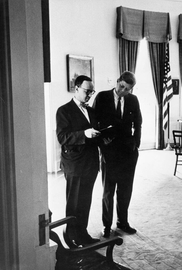 Meeting with Presidential Aide Arthur Schlesinger, Jr.. President John F. Kennedy meets with Special Assistant to the President, Arthur M. Schlesinger, Jr. left. Oval Office, White House, Washington,  ...