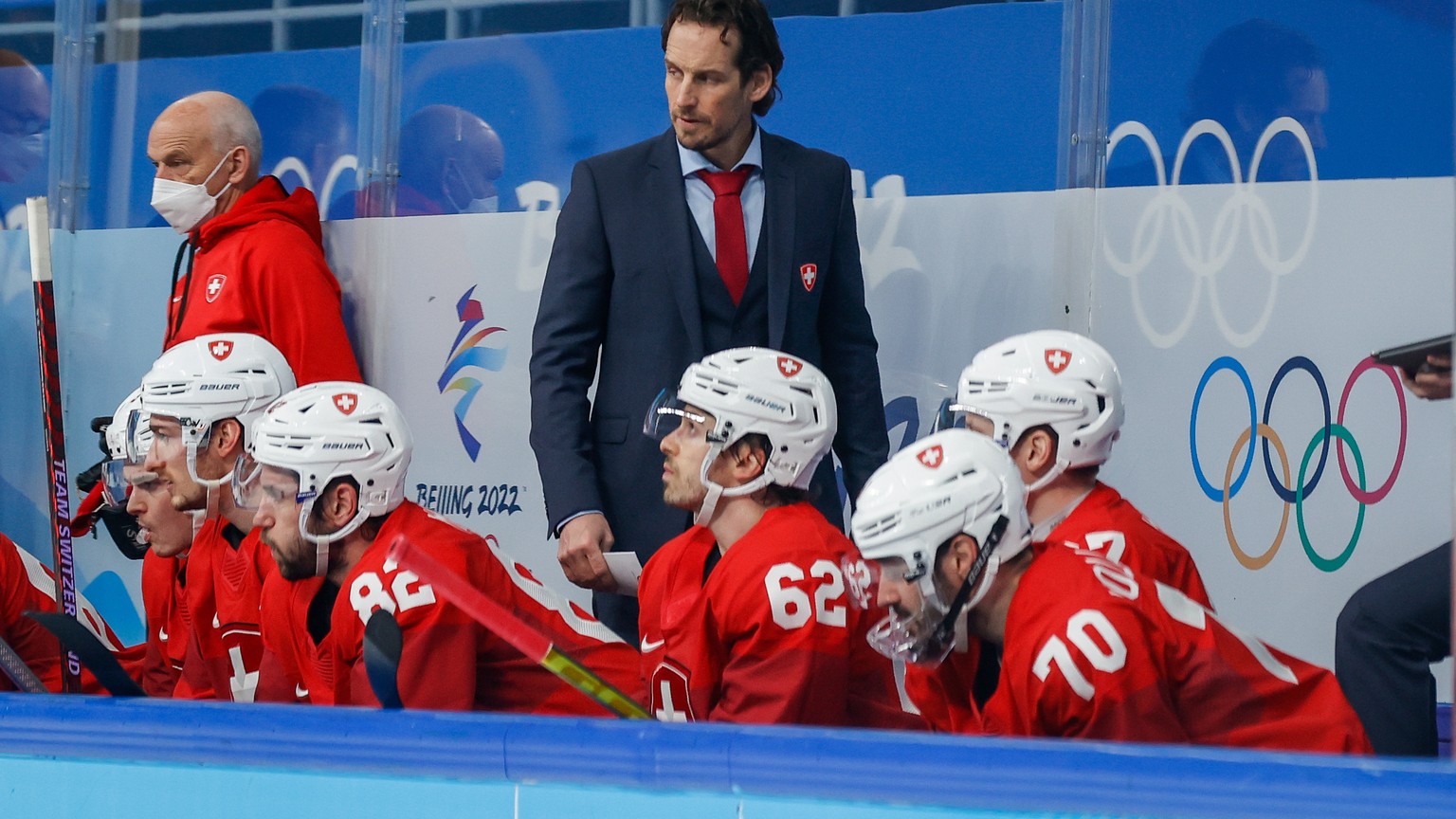 epa09750341 Switzerland head coach Patrick Fischer during the Men&#039;s Ice Hockey preliminary round match between Switzerland and Denmark at the Beijing 2022 Olympic Games, Beijing, China, 12 Februa ...