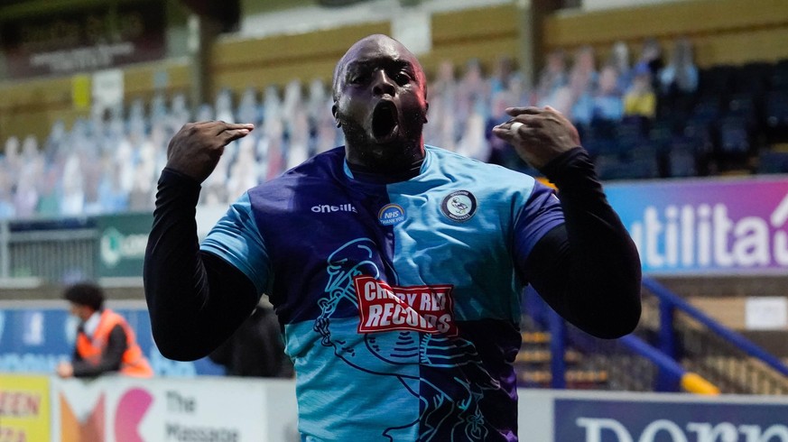 Adebayo Akinfenwa of Wycombe Wanderers celebrates after his team score their second goal of the gamer during the Sky Bet League 1 play-off semi-final 2nd leg match between Wycombe Wanderers 4 and Flee ...