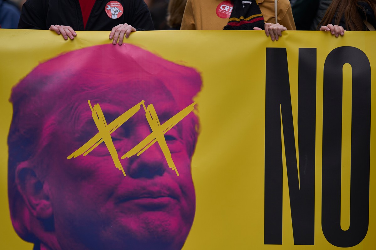 People hold a banner depicting U.S. President Donald Trump in Madrid, Spain, Saturday, March 21, 2026, during a protest calling for an end of the war on Iran. (AP Photo/Manu Fernandez)
Spain Iran War