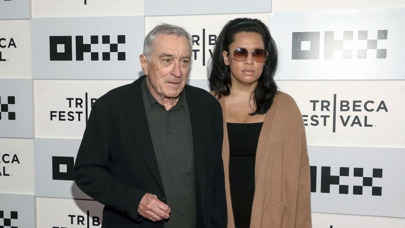 Actor Robert De Niro, left, and Tiffany Chen attend the Tribeca Festival opening night premiere of &quot;Kiss the Future&quot; at the OKX Theater at BMCC Tribeca Performing Arts Center on Wednesday, J ...