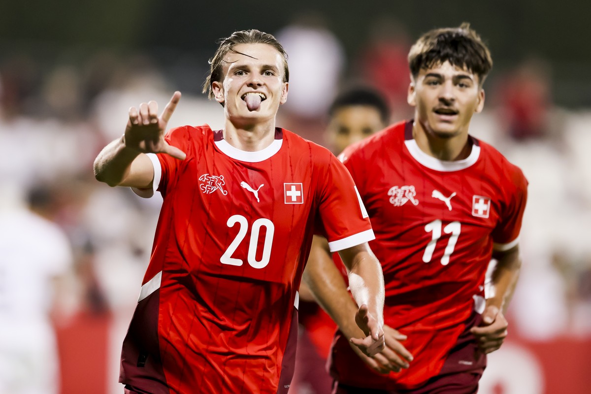 Switzerland's Jill Stiel, left, celebrates after scoring the 3:0 goal next to Switzerland's Nevio Scherrer, right, during the FIFA Under-17 World Cup, round of 32 soccer match between Switze ...