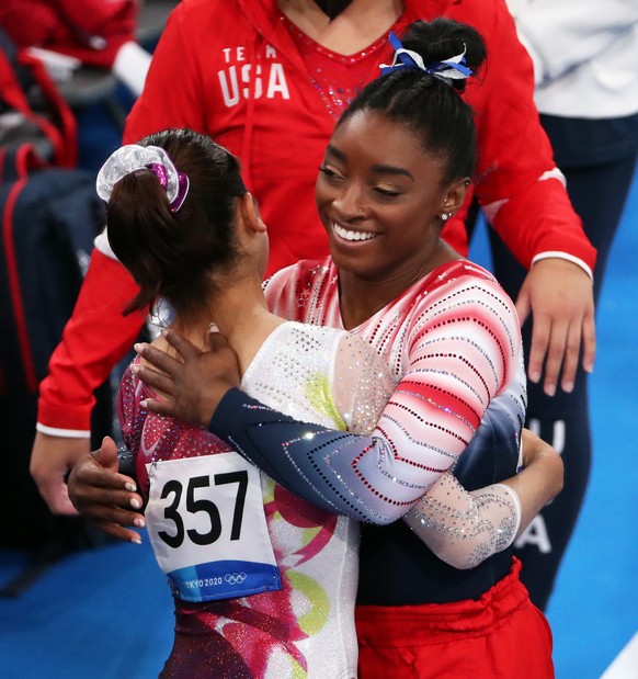 epa09390599 Simone Biles of the USA (R) during the Women&#039;s Balance Beam Final during the Artistic Gymnastics events of the Tokyo 2020 Olympic Games at the Ariake Gymnastics Centre in Tokyo, Japan ...