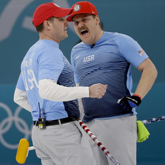 United States&#039;s skip John Shuster, left, and Matt Hamilton react during the men&#039;s final curling match against Sweden at the 2018 Winter Olympics in Gangneung, South Korea, Saturday, Feb. 24, ...