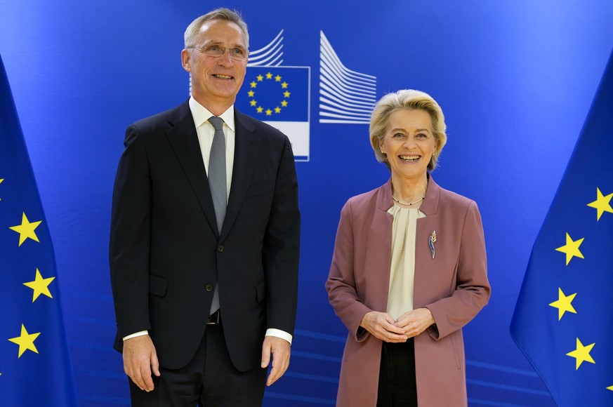 European Commission President Ursula von der Leyen, right, greets NATO Secretary General Jens Stoltenberg prior to a meeting of the College of Commissioners at EU headquarters in Brussels, Wednesday,  ...