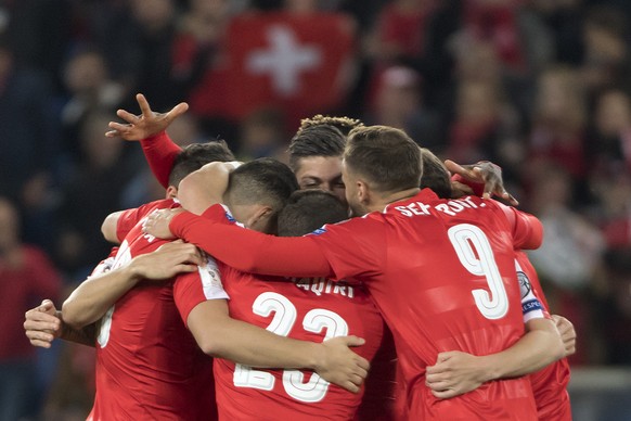 Switzerland&#039;s players cheer during the 2018 Fifa World Cup Russia group B qualification soccer match between Switzerland and Hungary in the St. Jakob-Park stadium in Basel, Switzerland, on Saturd ...