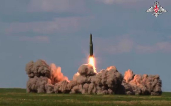 In this image made from video provided by Russian Defense Ministry Press Service on Thursday, May 21, 2026, An Iskander missile is launched by a Belarusian crew from the Kapustin Yar firing range in R ...