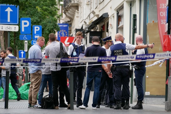 Police cordon off an area in the center of Brussels after an incident in which a van hit a terrace in Brussels, Friday, Aug. 26, 2022. Belgian security services were assessing an incident Friday durin ...