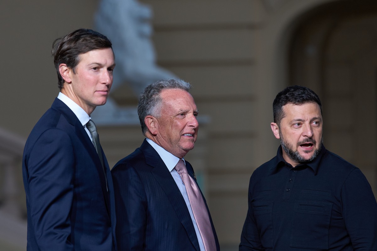 Ukraine's President Volodymyr Zelenskyy, right, stands with Steve Witkoff, center, and Jared Kushner, U.S. President Donald Trump's envoys, at the end of their joint news conference in Kyiv, ...
