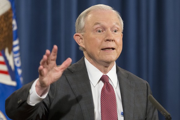 epa05825858 US Attorney General Jeff Sessions holds a news conference in which he recused himself from any current or future investigations into Russia ties to the Trump campaign, at the Justice Depar ...