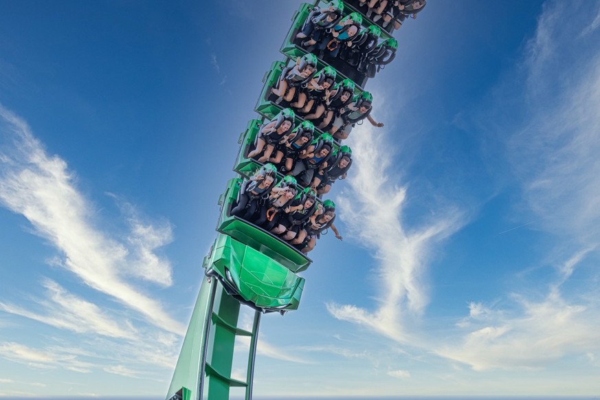 ORLANDO, USA - MARCH 07 2022: People enjoying riding the Incredible Hulk rollercoaster