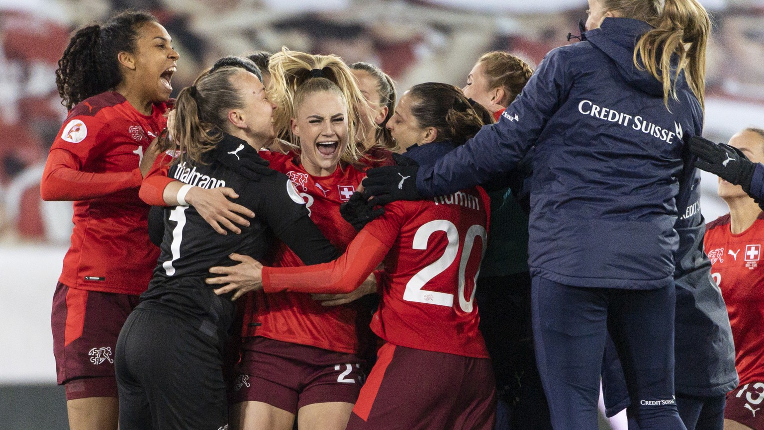 Swiss players, with Coumba Sow, goalkeeper Gaelle Thalmann, Alisha Lehmann and Fabienne Humm, from left, celebrate after winning in penalties the UEFA Women&#039;s Euro 2022 play-off 2nd leg qualifica ...