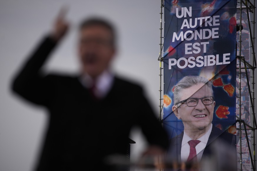 Far-left leader Jean-Luc Melenchon speaks during a rally at the Prado beach in Marseille, southern France, Sunday, March 27, 2022. Polling in third or fourth place, Melenchon aimed to unite left-leani ...