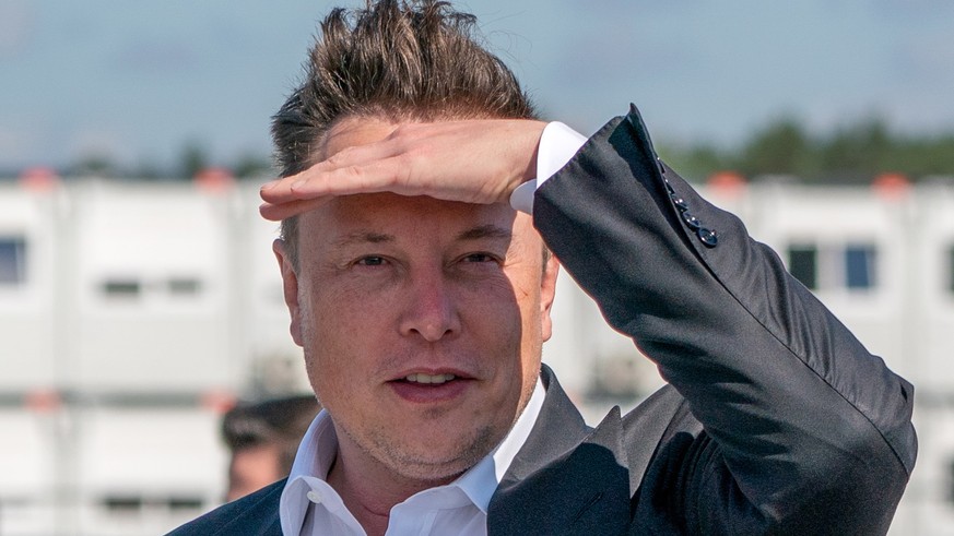 epa09889605 (FILE) - Tesla and SpaceX CEO Elon Musk arrives for a statement at the construction site of the Tesla Giga Factory in Gruenheide near Berlin, Germany, 03 September 2020 (reissued 14 April  ...