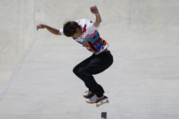 Yuto Horigome of Japan competes in the men's street skateboarding finals at the 2020 Summer Olympics, Sunday, July 25, 2021, in Tokyo, Japan. (AP Photo/=03370548=)
Yuto Horigome