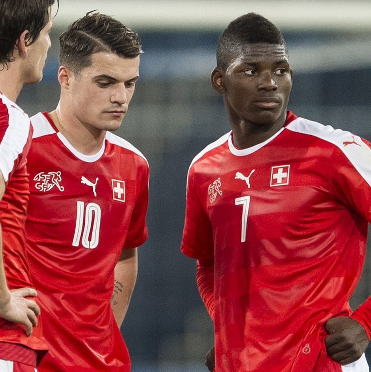 Swiss defender Timm Klose, Swiss midfielder Granit Xhaka, and Swiss forward Breel Embolo, from left, reacts after the friendly soccer match between Switzerland and Bosnia Herzegovina at the Letzigrund ...