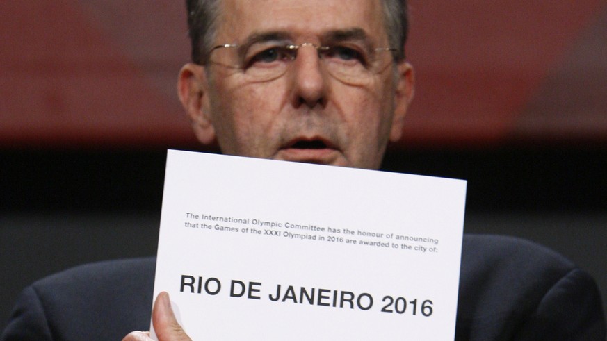 FILE - AUGUST 4, 2015: With one year to go before the start of the 2016 Summer Olympics, host city Rio de Janeiro continues to prepare. COPENHAGEN, DENMARK - OCTOBER 2: IOC President Jacques Rogge ope ...