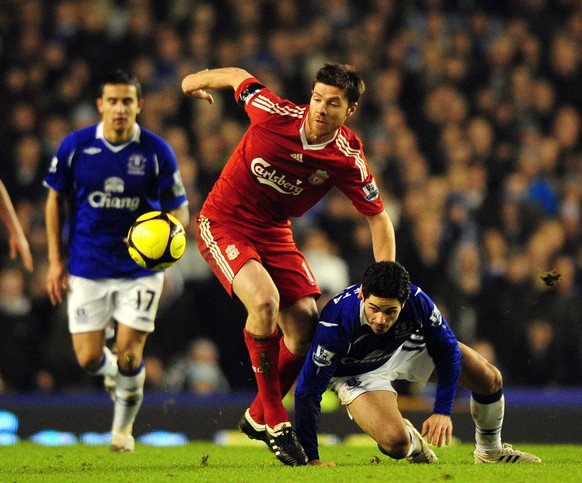 Xabi Alonso of Liverpool and Mikel Arteta of Everton Xabi Alonso of Liverpool and Mikel Arteta of Everton..EON FA Cup 4th Round..Everton v Liverpool..4th February, 2009.Credit Image: PHOTOGRAPHER/Spor ...