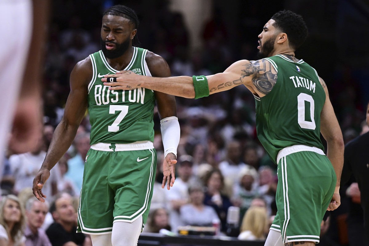 Boston Celtics guard Jaylen Brown (7) is congratulated by forward Jayson Tatum (0) after a after a 3-point basket during the second half of Game 4 of an NBA basketball second-round playoff series agai ...