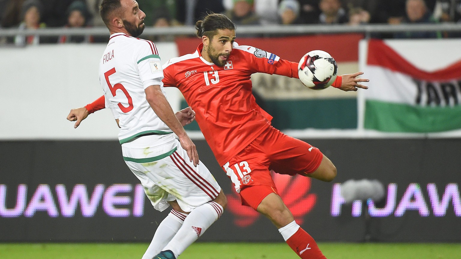 epa05575485 Ricardo Rodriguez (R) of Switzerland scores a goal during FIFA World Cup 2018 qualification soccer match between Hungary and Switzerland at the Groupama Arena in Budapest, Hungary, 07 Octo ...